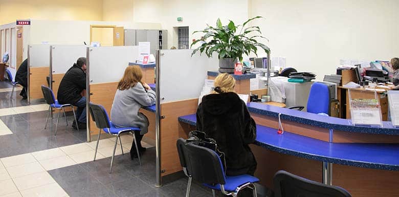 State office with individual cubes where people meeting