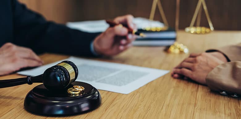 Man explaining paperwork to client